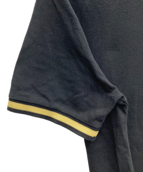 FRED PERRY（フレッドペリー）FRED PERRY (フレッドペリー) ポロシャツ ブラック×イエロー サイズ:SIZE 42の古着・服飾アイテム