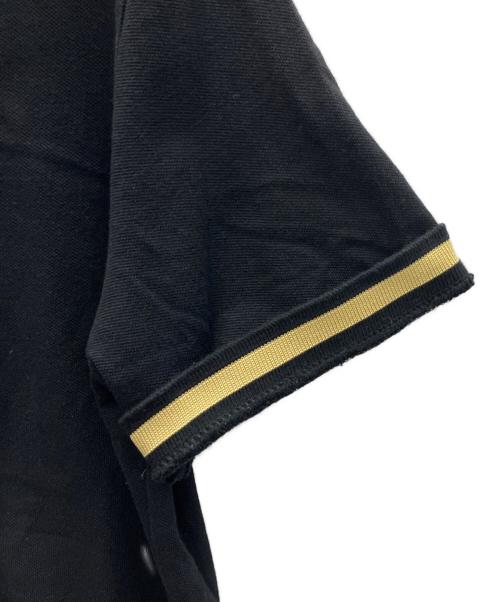 FRED PERRY（フレッドペリー）FRED PERRY (フレッドペリー) ポロシャツ ブラック×イエロー サイズ:SIZE 42の古着・服飾アイテム