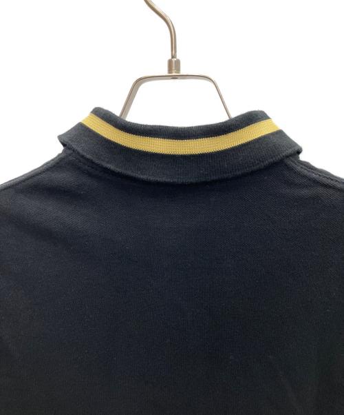 FRED PERRY（フレッドペリー）FRED PERRY (フレッドペリー) ポロシャツ ブラック×イエロー サイズ:SIZE 42の古着・服飾アイテム