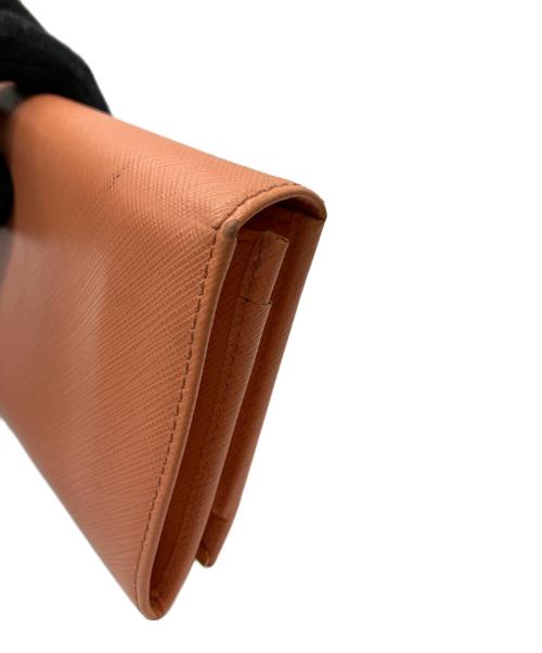 Salvatore Ferragamo（サルヴァトーレ フェラガモ）Salvatore Ferragamo (サルヴァトーレ フェラガモ) 長財布 オレンジの古着・服飾アイテム