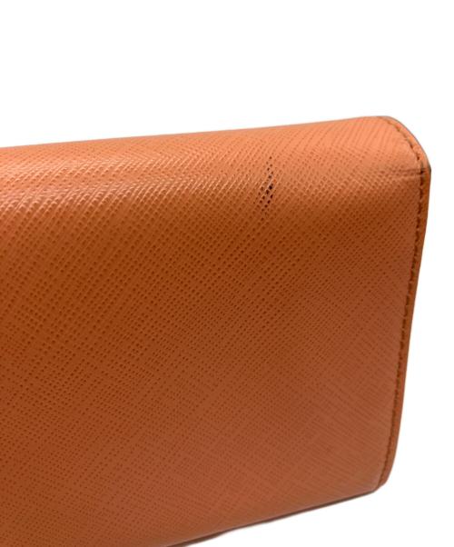 Salvatore Ferragamo（サルヴァトーレ フェラガモ）Salvatore Ferragamo (サルヴァトーレ フェラガモ) 長財布 オレンジの古着・服飾アイテム