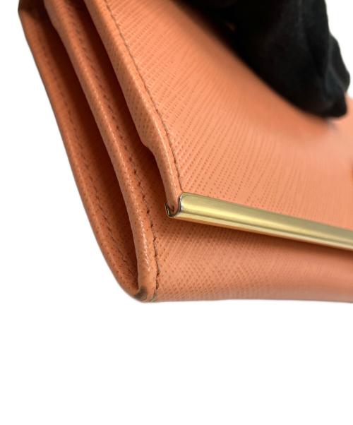 Salvatore Ferragamo（サルヴァトーレ フェラガモ）Salvatore Ferragamo (サルヴァトーレ フェラガモ) 長財布 オレンジの古着・服飾アイテム