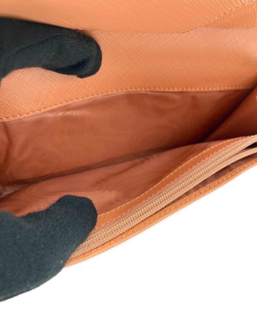 Salvatore Ferragamo（サルヴァトーレ フェラガモ）Salvatore Ferragamo (サルヴァトーレ フェラガモ) 長財布 オレンジの古着・服飾アイテム