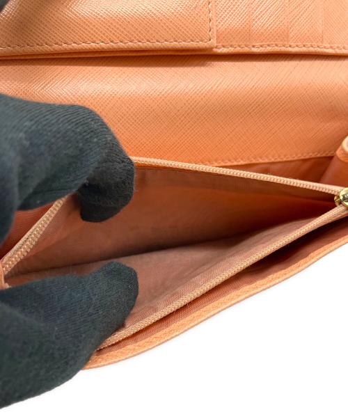 Salvatore Ferragamo（サルヴァトーレ フェラガモ）Salvatore Ferragamo (サルヴァトーレ フェラガモ) 長財布 オレンジの古着・服飾アイテム