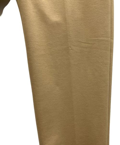 LACOSTE（ラコステ）LACOSTE (ラコステ) センタープレスパンツ ベージュ サイズ:SIZE34 未使用品の古着・服飾アイテム