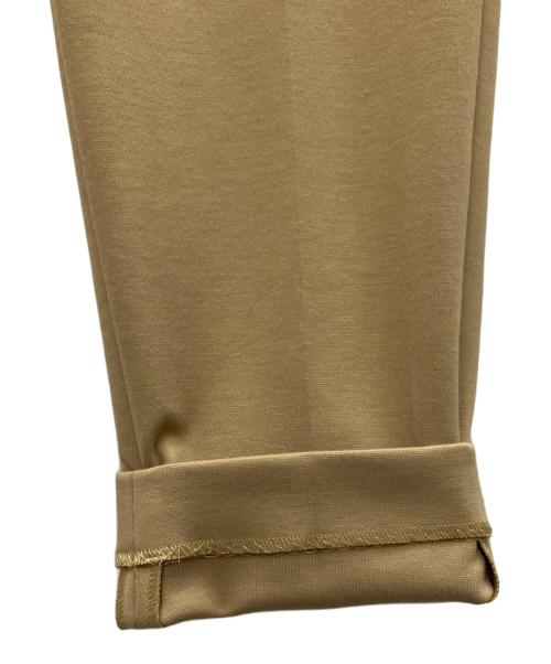 LACOSTE（ラコステ）LACOSTE (ラコステ) センタープレスパンツ ベージュ サイズ:SIZE34 未使用品の古着・服飾アイテム