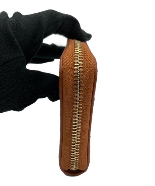 COACH（コーチ）COACH (コーチ) Disney (ディズニー) アコーディオン ジップ ウォレット シグネチャー ミッキーマウス エンブロイダリーの古着・服飾アイテム