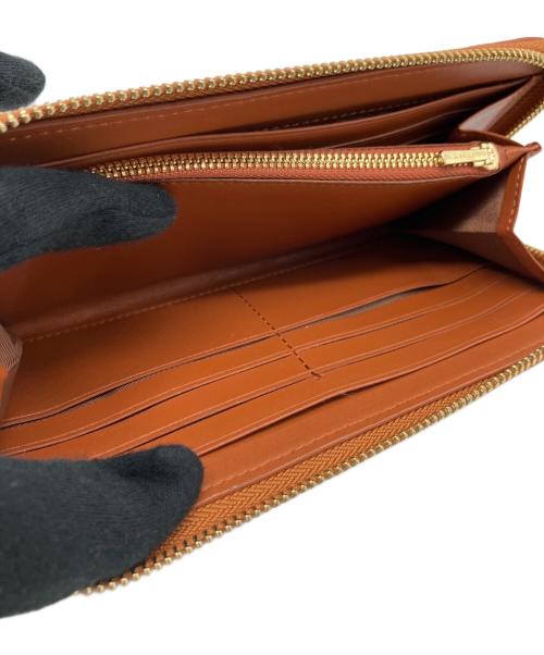 COACH（コーチ）COACH (コーチ) Disney (ディズニー) アコーディオン ジップ ウォレット シグネチャー ミッキーマウス エンブロイダリーの古着・服飾アイテム