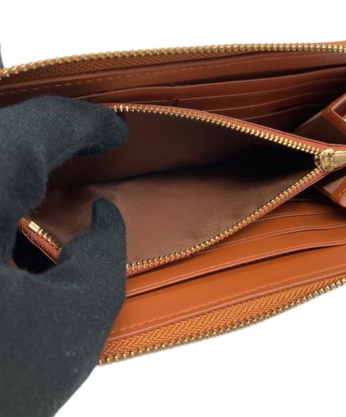 COACH（コーチ）COACH (コーチ) Disney (ディズニー) アコーディオン ジップ ウォレット シグネチャー ミッキーマウス エンブロイダリーの古着・服飾アイテム