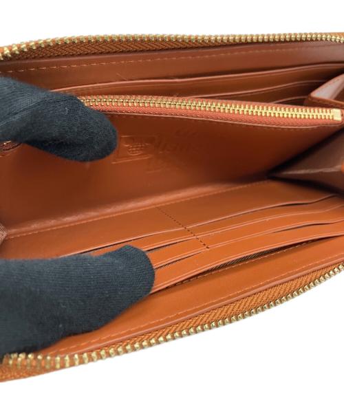 COACH（コーチ）COACH (コーチ) Disney (ディズニー) アコーディオン ジップ ウォレット シグネチャー ミッキーマウス エンブロイダリーの古着・服飾アイテム