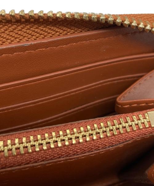 COACH（コーチ）COACH (コーチ) Disney (ディズニー) アコーディオン ジップ ウォレット シグネチャー ミッキーマウス エンブロイダリーの古着・服飾アイテム