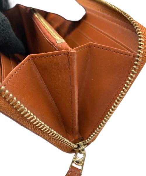 COACH（コーチ）COACH (コーチ) Disney (ディズニー) アコーディオン ジップ ウォレット シグネチャー ミッキーマウス エンブロイダリーの古着・服飾アイテム