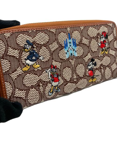 COACH（コーチ）COACH (コーチ) Disney (ディズニー) アコーディオン ジップ ウォレット シグネチャー ミッキーマウス エンブロイダリーの古着・服飾アイテム