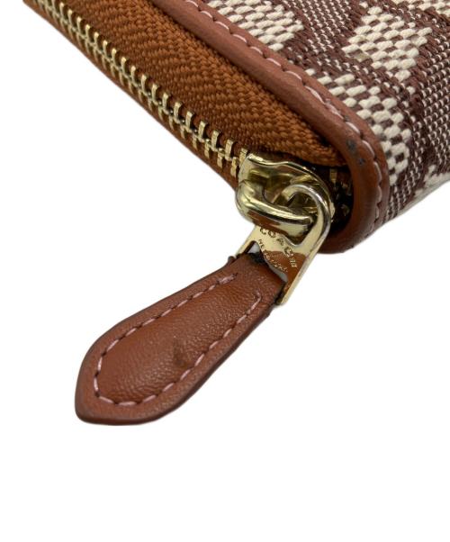 COACH（コーチ）COACH (コーチ) Disney (ディズニー) アコーディオン ジップ ウォレット シグネチャー ミッキーマウス エンブロイダリーの古着・服飾アイテム