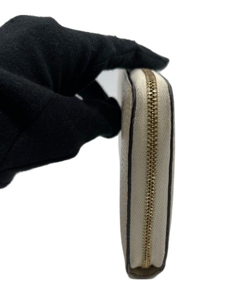 CELINE（セリーヌ）CELINE (セリーヌ) ラウンドファスナー財布 アイボリーの古着・服飾アイテム