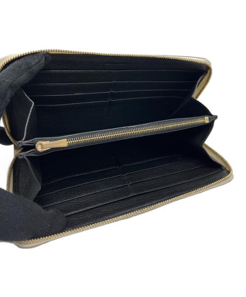 CELINE（セリーヌ）CELINE (セリーヌ) ラウンドファスナー財布 アイボリーの古着・服飾アイテム