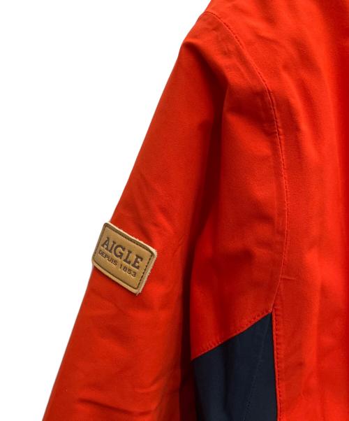 AIGLE（エーグル）AIGLE (エーグル) マウンテンパーカー レッド×ネイビー サイズ:L 未使用品の古着・服飾アイテム