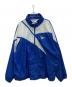 REEBOK（リーボック）の古着「ナイロンジャケット」｜ネイビー