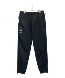 F.C.R.B.（エフシーレアルブリストル）の古着「4WAY STRETCH SIDE LINE PANTS」｜ブラック