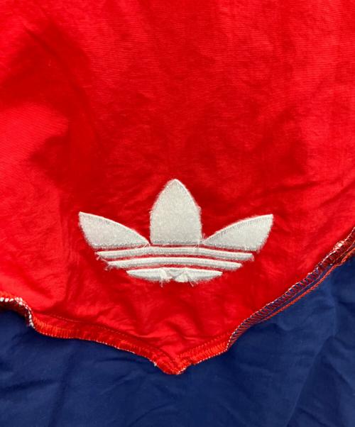 adidas（アディダス）adidas (アディダス) ナイロンジャケット ブルー×レッド サイズ:XLの古着・服飾アイテム