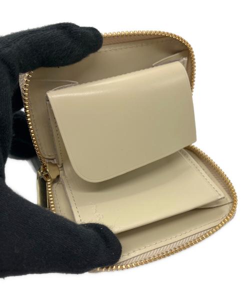 NADAYA（ナダヤ）NADAYA (ナダヤ) 2つ折り財布 ゴールドの古着・服飾アイテム