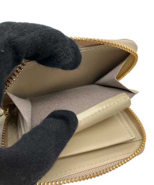 NADAYA（ナダヤ）NADAYA (ナダヤ) 2つ折り財布 ゴールドの古着・服飾アイテム