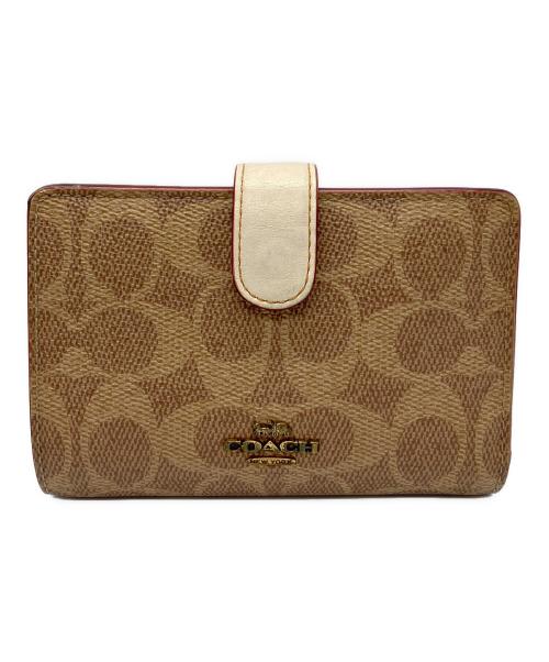 COACH（コーチ）COACH (コーチ) 2つ折り財布 ベージュの古着・服飾アイテム