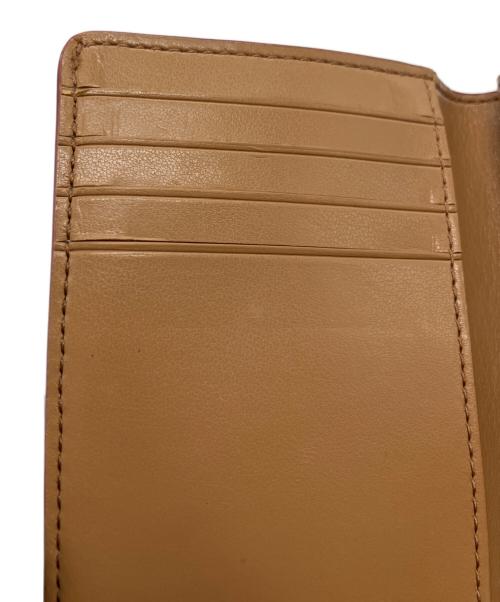 COACH（コーチ）COACH (コーチ) 2つ折り財布 ベージュの古着・服飾アイテム