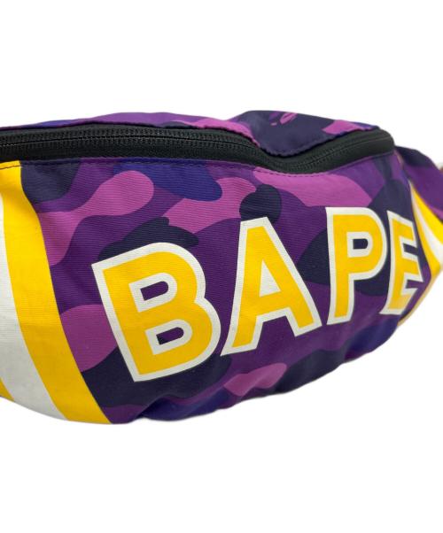 A BATHING APE（アベイシングエイプ）A BATHING APE (アベイシングエイプ) ウエストバッグ パープル×イエローの古着・服飾アイテム