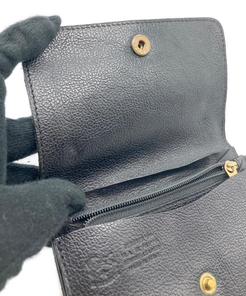 IL BISONTE（イル ビゾンテ）IL BISONTE (イル ビゾンテ) 2つ折り財布 ブラックの古着・服飾アイテム