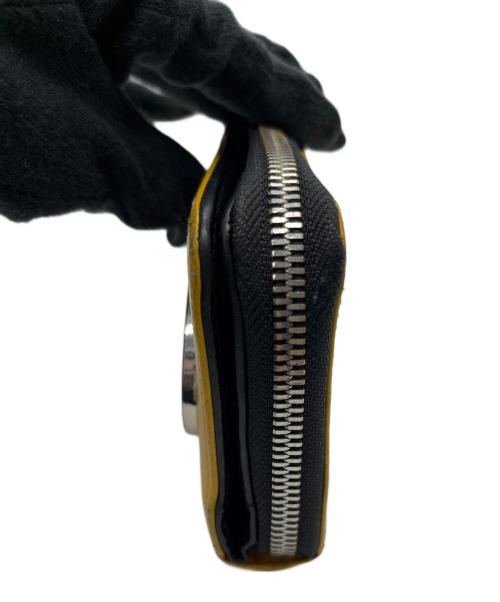 DIESEL（ディーゼル）DIESEL (ディーゼル) 2つ折り財布 イエローの古着・服飾アイテム