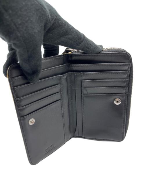 DIESEL（ディーゼル）DIESEL (ディーゼル) 2つ折り財布 イエローの古着・服飾アイテム