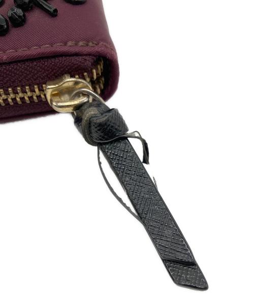 Kate Spade（ケイトスペード）Kate Spade (ケイトスペード) ラウンドファスナー財布 パープルの古着・服飾アイテム