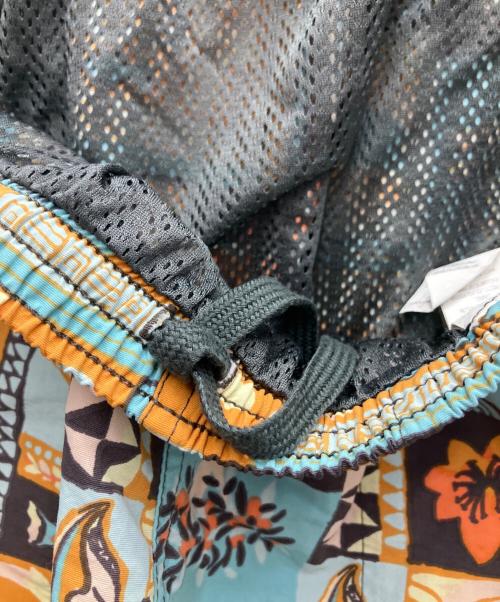 Patagonia（パタゴニア）Patagonia (パタゴニア) BAGGIES SHORTS ブルー×オレンジ サイズ:SIZE Mの古着・服飾アイテム
