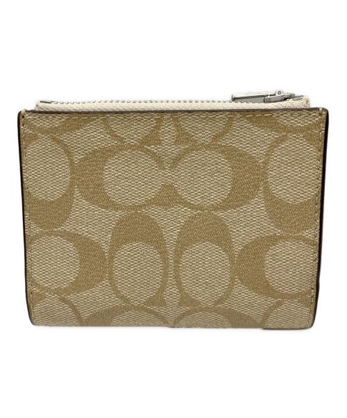 COACH（コーチ）COACH (コーチ) 2つ折り財布 ベージュの古着・服飾アイテム