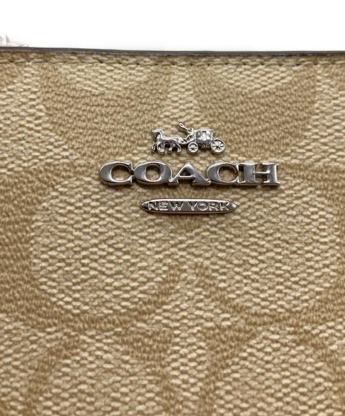 COACH（コーチ）COACH (コーチ) 2つ折り財布 ベージュの古着・服飾アイテム