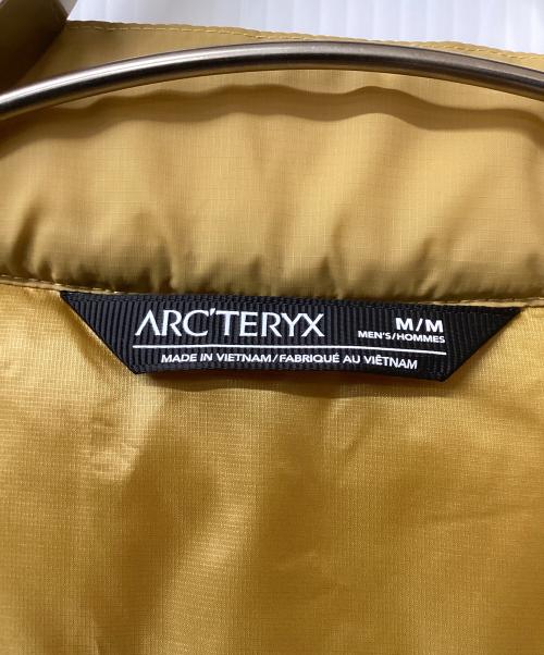 ARC'TERYX（アークテリクス）ARC'TERYX (アークテリクス) ダウンジャケット イエロー サイズ:Mの古着・服飾アイテム