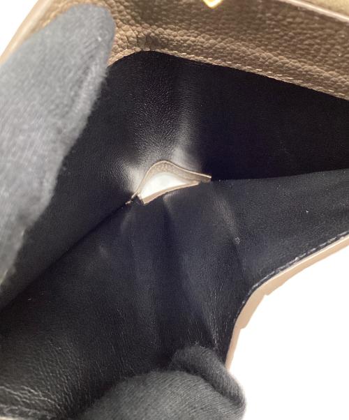 Saint Laurent Paris（サンローランパリ）Saint Laurent Paris (サンローランパリ) 2つ折り財布 ベージュの古着・服飾アイテム