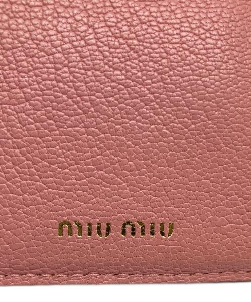 MIU MIU（ミュウミュウ）MIU MIU (ミュウミュウ) 2つ折り財布 ピンクの古着・服飾アイテム