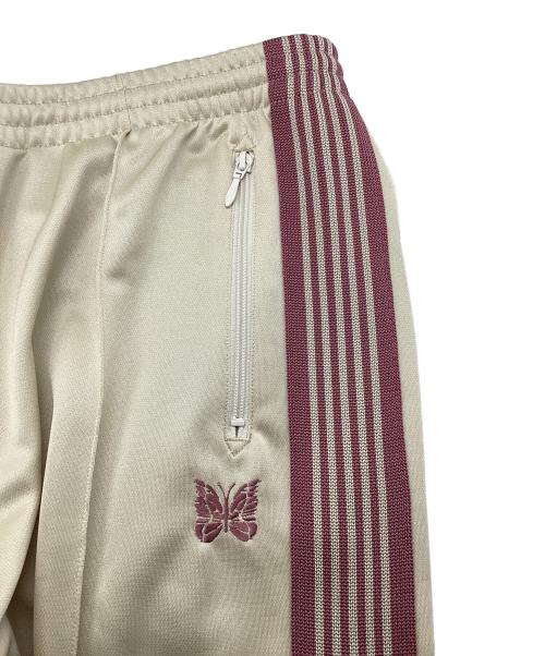 Needles（ニードルズ）Needles (ニードルズ) トラックパンツ ベージュ×ピンク サイズ:XLの古着・服飾アイテム