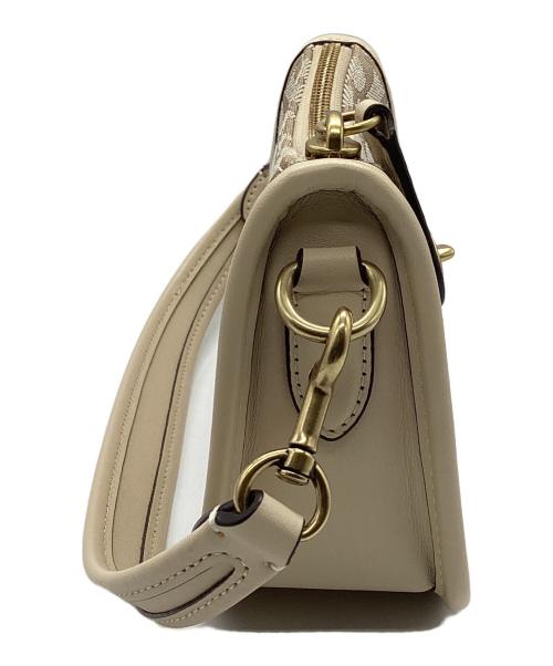 COACH（コーチ）COACH (コーチ) シグネチャー スウィンガー  ベージュの古着・服飾アイテム