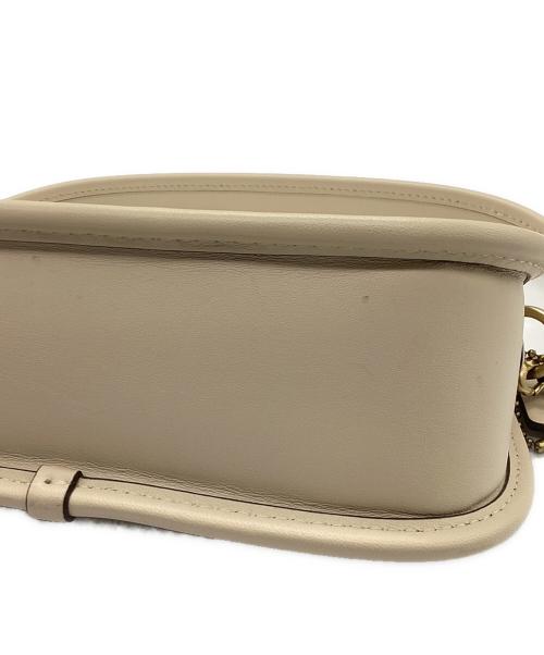 COACH（コーチ）COACH (コーチ) シグネチャー スウィンガー  ベージュの古着・服飾アイテム