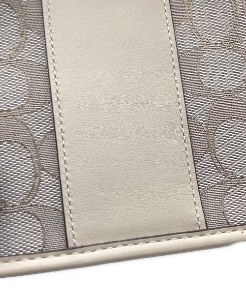 COACH（コーチ）COACH (コーチ) シグネチャー スウィンガー  ベージュの古着・服飾アイテム