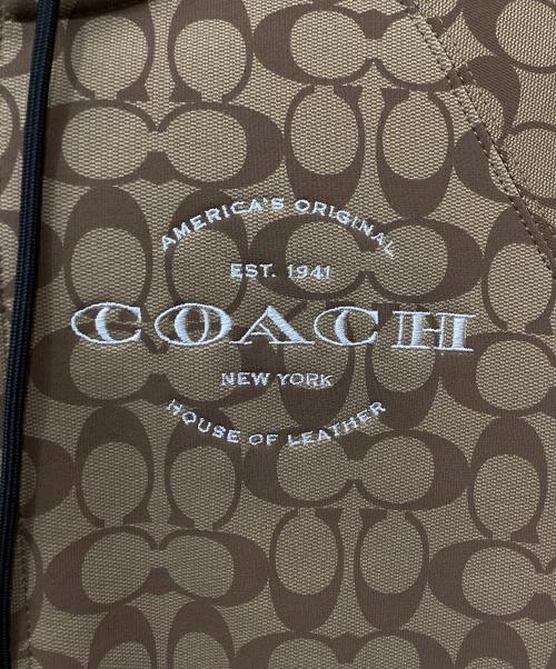 COACH（コーチ）COACH (コーチ) ジップパーカー シグネチャー ベージュ×ブラック サイズ:Mの古着・服飾アイテム
