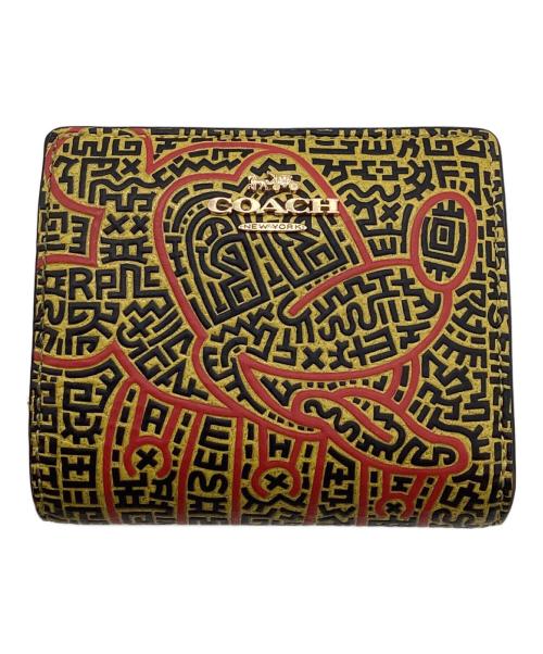 COACH（コーチ）COACH (コーチ) DISNEY (ディズニー) Keith Haring (キースヘリング) 2つ折り財布 イエローの古着・服飾アイテム