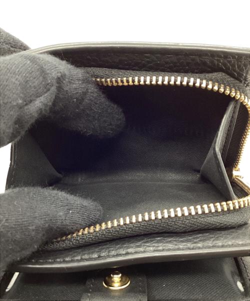 COACH（コーチ）COACH (コーチ) DISNEY (ディズニー) Keith Haring (キースヘリング) 2つ折り財布 イエローの古着・服飾アイテム