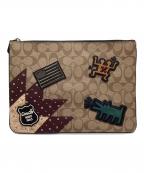 COACHコーチ）の古着「クラッチバッグ シグネチャー」