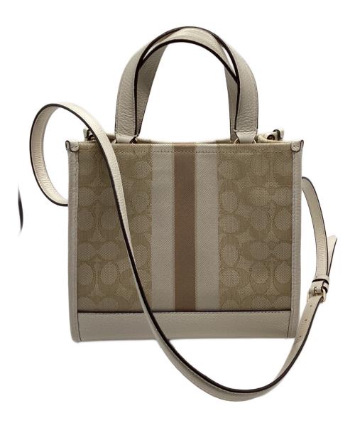COACH（コーチ）COACH (コーチ) デンプシートート22 シグネチャー ジャカード・ストライプ アンド コーチ パッチ ベージュの古着・服飾アイテム