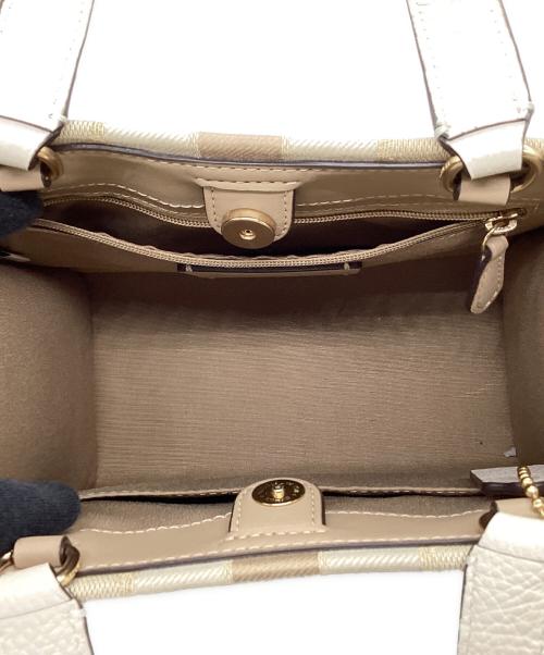 COACH（コーチ）COACH (コーチ) デンプシートート22 シグネチャー ジャカード・ストライプ アンド コーチ パッチ ベージュの古着・服飾アイテム