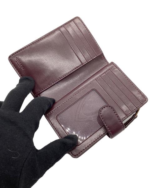 COACH（コーチ）COACH (コーチ) 2つ折り財布　シグネチャー ブラウンの古着・服飾アイテム